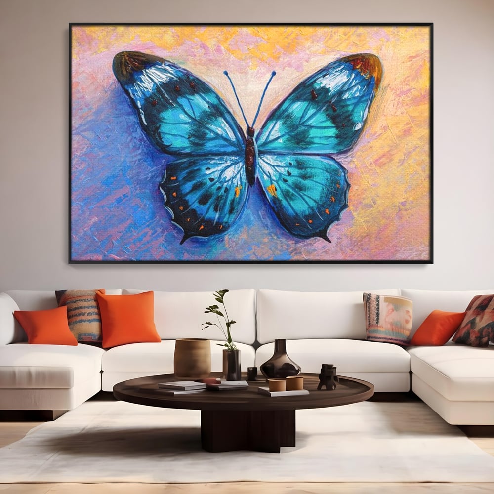 Tablou canvas cu tablou canvas cu fluture albastru, in rama de aluminiu negru, pe perete intr-un living